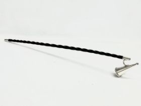 A Victorian silver plated Baleen candle snuffer. 71cm