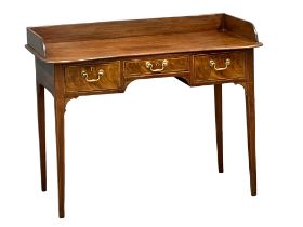 A late George III inlaid mahogany gallery back side table with 2 drawers. Circa 1800-1810.