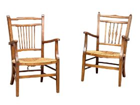 A near pair of early 20th century armchairs with rush seats. 51x46x80cm(3)
