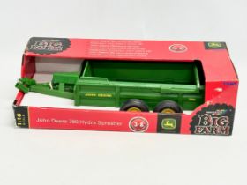 A Britains Big Farm John Deere 780 Hydra Spreader in box. 41cm