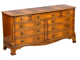 A large Georgian style inlaid mahogany chest of drawers on bracket feet. 153x45.5x78cm(4)