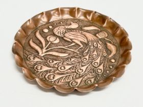 A late 19th century Irish Arts & Crafts copper ‘Peacock’ card tray. By John Williams. Circa 1890-