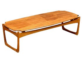 A Danish Mid Century teak coffee table designed by Peter Hvidt & Orla Mølgaard Nielsen For