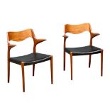 A pair of rare Danish Mid Century teak carver armchairs designed by Niels Otto Moller for J.L.
