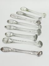 A collection of 8 George III handmade glass sugar crushers. Circa 1800-1820. 13cm