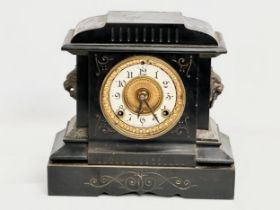 A late 19th century American slate, marble and brass mantle clock. Ansonia Clock Co. With key and