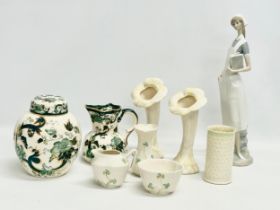 A collection of pottery. A pair of 4th period Belleek pottery sunflower trumpet vases 19.5cm. A