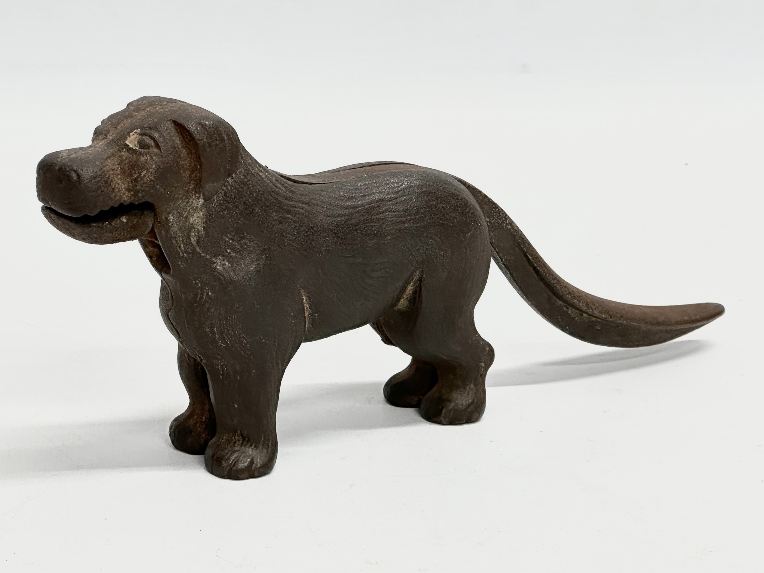 A late 19th century cast iron dog nutcracker. 22cm