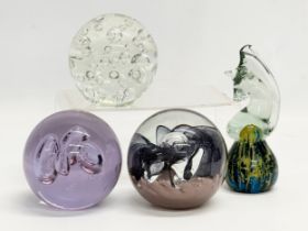 4 large Art Glass paperweights. Including an Mdina ‘Seahorse’ paperweight.