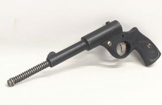 A vintage The British Cub pop-out air pistol