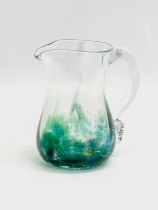 An Irish Art Glass ‘Seascape’ jug by Jerpoint Glass. 14x9x15cm