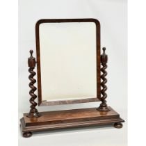 A large Victorian mahogany dressing mirror with Barley Twist supports. 77x25x83cm