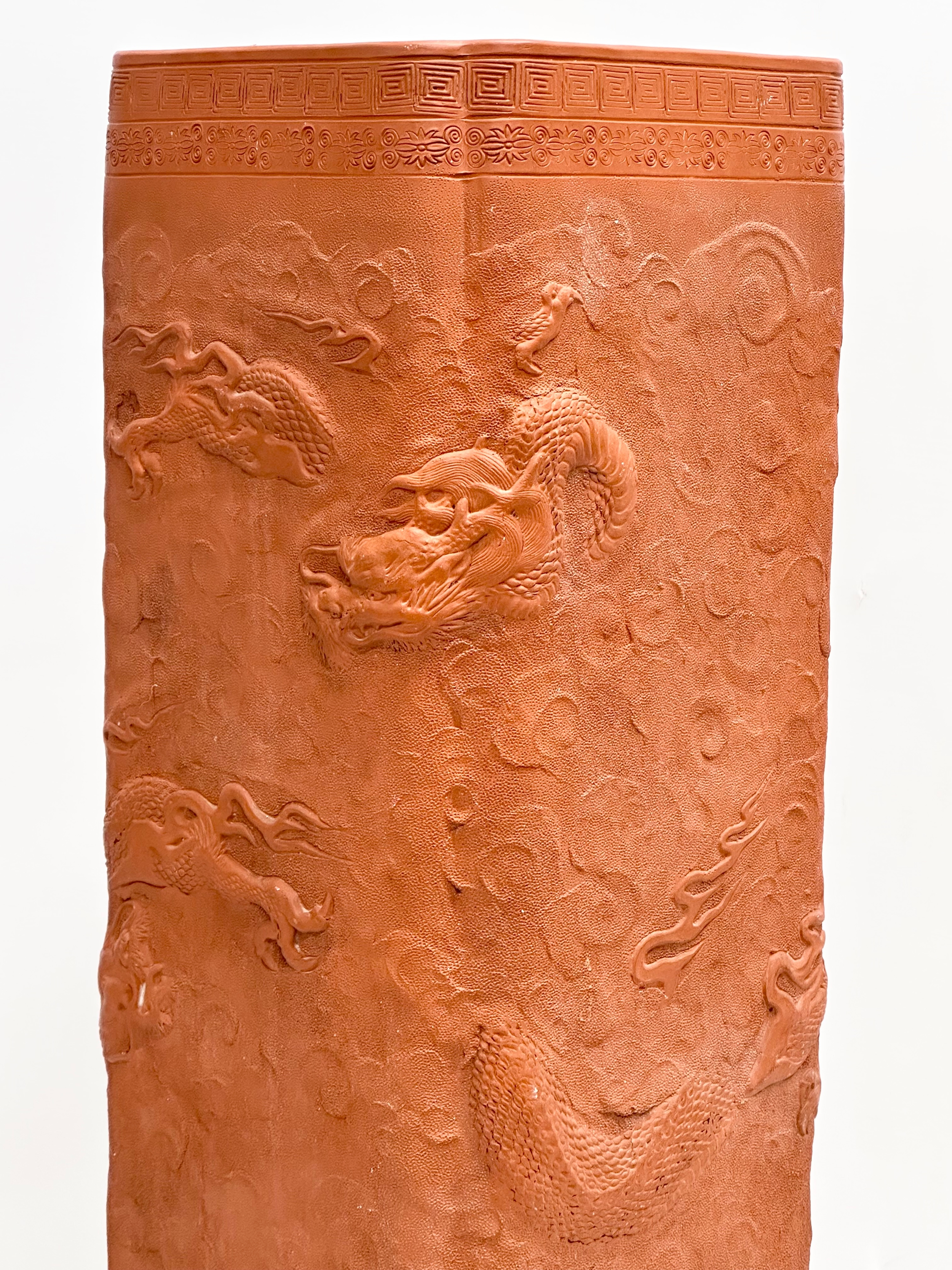A Chinese terracotta stick stand/planter with dragon motif and Greek Key decoration. 21x21x61cm - Image 7 of 8