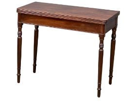 A George IV mahogany turnover tea table. 90.5x44.5x75.5cm