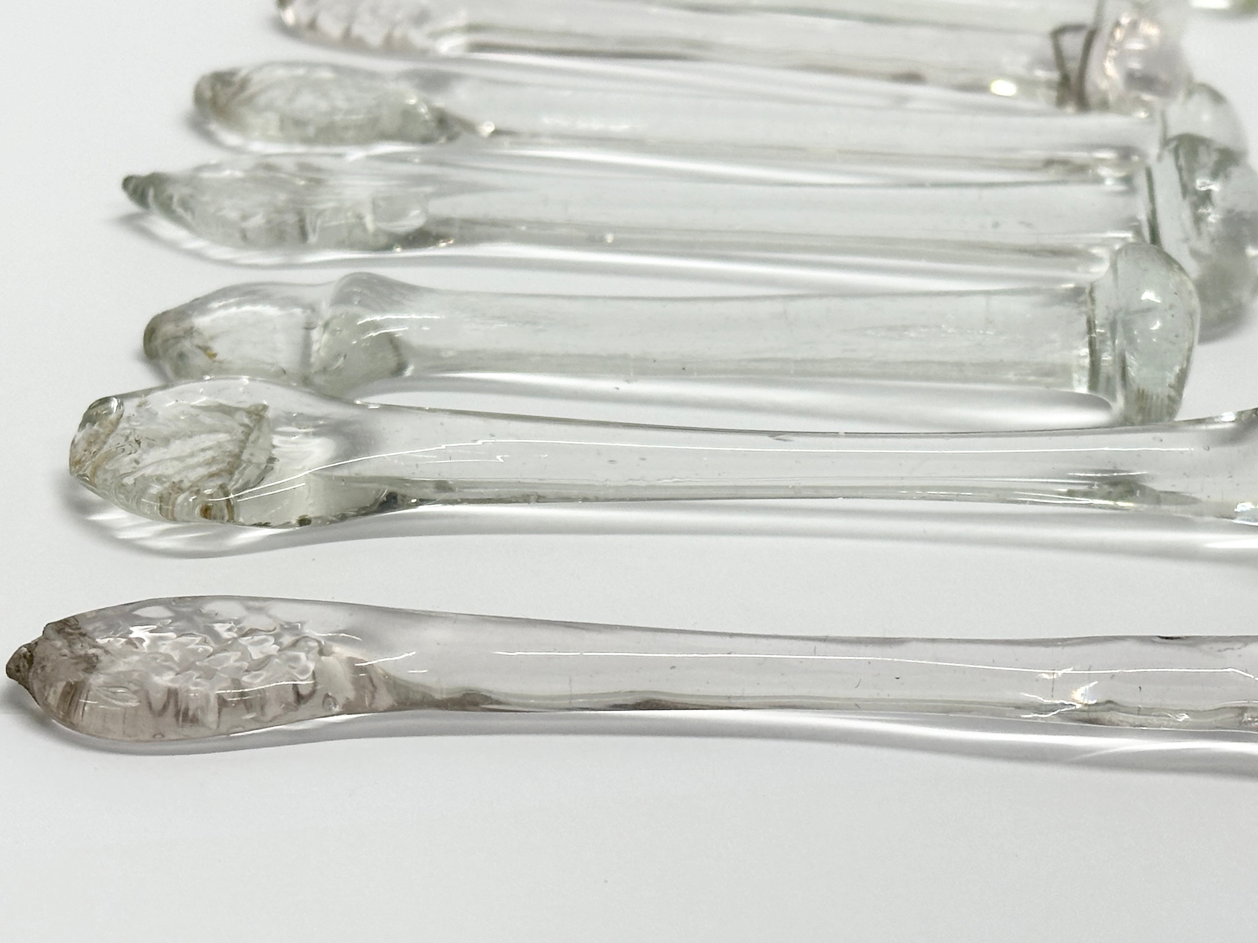 A collection of 8 George III handmade glass sugar crushers. Circa 1800-1820. 13cm - Image 2 of 4