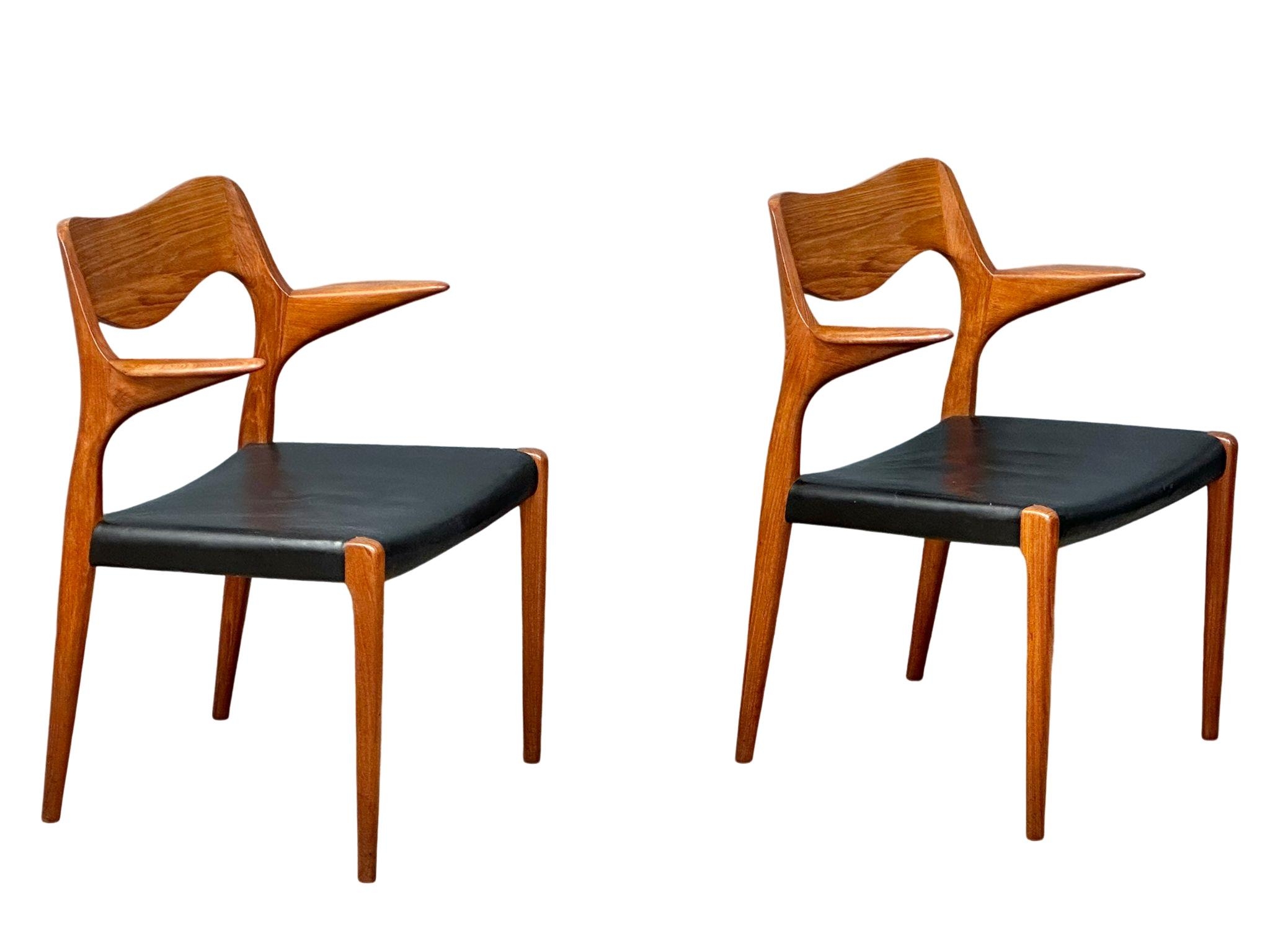 A pair of rare Danish Mid Century teak carver armchairs designed by Niels Otto Moller for J.L. - Image 11 of 12