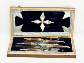 A late 19th century silver mounted James Deakin & Sons carving set in case. 46.5x23cm