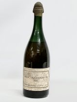 A magnum of Marc De Champagne 1923. Champagne Pommery art Greno Reims.