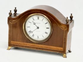 A late 19th/early 20th century inlaid mahogany mantle clock by Reid & Sons. Swiss made. Circa 1890-