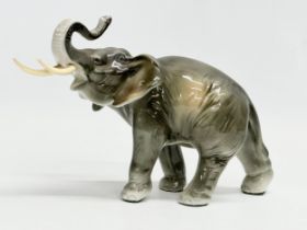 A Royal Dux pottery elephant. 23x15cm