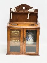 A late Victorian oak humidor. 28.5x18x41.5cm