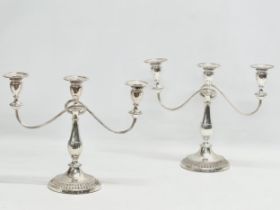 A pair of vintage silver plated candelabras. 37x29cm