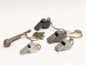 A collection of vintage whistles