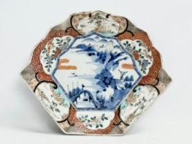 A late 19th century Japanese Meiji period (1868-1912) Imari Fan Shaped bowl. Decorated with birds in