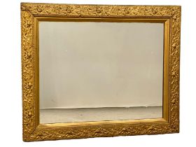 A large late Victorian gilt framed mirror. 104x85.5cm