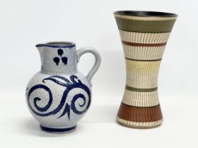 German pottery. A West German jug by Scheurich Keramik 16x21cm. A German pottery vase 15x27cm