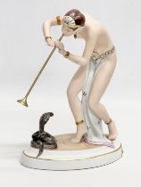 A Royal Dux ‘Snake Charmer’ figurine. 1990’s. 19x10x24cm