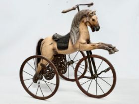 A Victorian style child’s Velocipede/horse tricycle. 86x61x80cm