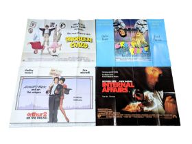 A collection of vintage movie posters / film posters. Including Crazy People, Problem Child,