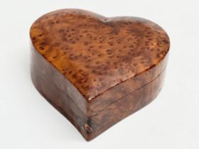 A Burr Elm heart shaped trinket box. 14x14x6cm