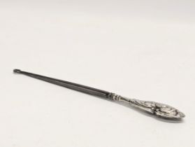 A silver handled button hook by Henry Matthews. Birmingham.