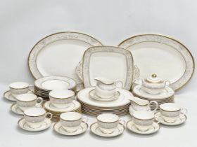 A 56 piece Royal Doulton ‘Naples’ dinner service. A pair of large meat platters 41x31.5cm. A 2