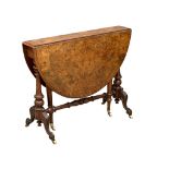 A large Victorian Burr Walnut sutherland table on carved base with cabriole legs. 109cmx92cmx73cm.