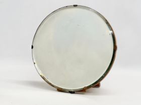 A small 1930’s tabletop bevelled mirror. 23cm