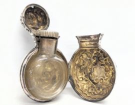 A 19th century silver perfume bottle case with original glass bottle. Birmingham, 1875. Case
