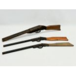 3 vintage toy gun. 2 rifles and a shotgun. 61cm