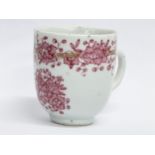 An 18th century Lowestoft porcelain coffee cup. Circa 1760-1780. 8x6x6.5cm