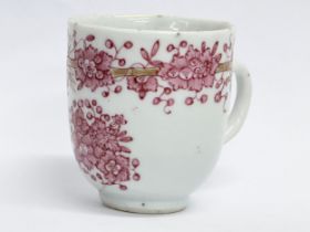 An 18th century Lowestoft porcelain coffee cup. Circa 1760-1780. 8x6x6.5cm