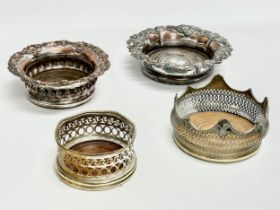 4 Georgian and Victorian silver plated bottle coasters. 19.5cm. 17cm.