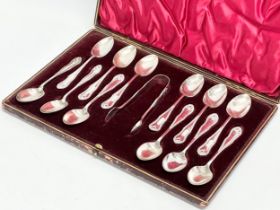 Early 20th century James Deakin & Sons plated spoons and tongs with case. 26.5x19cm