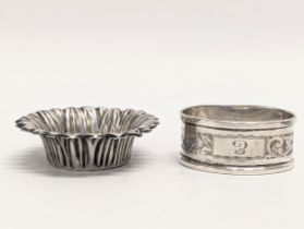 2 pieces of silver including a napkin ring by Henry Griffith & Sons. Birmingham, 1953. 33.7g