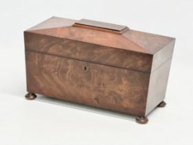 A Regency mahogany sarcophagus tea caddy. Circa 1810. 31x15x19.5cm