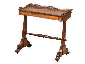 An excellent quality William IV rosewood gallery back side table/work table with hidden drawers.