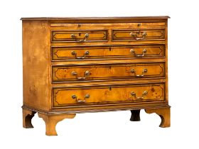 A George III style Burr Walnut Bachelors chest of drawers on bracket feet. 93x52x79cm