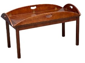 A large mahogany butlers tray on stand coffee table. 111x59x64cm up. 134x79x53cm down.(1)