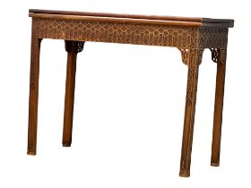 A 19th century Chinese Chippendale Revival mahogany turnover games table. Circa 1860-1880. 91.5x45.